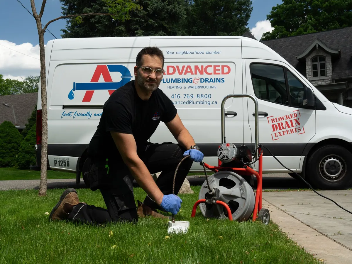 Our technician with a drum drain cleaning machine