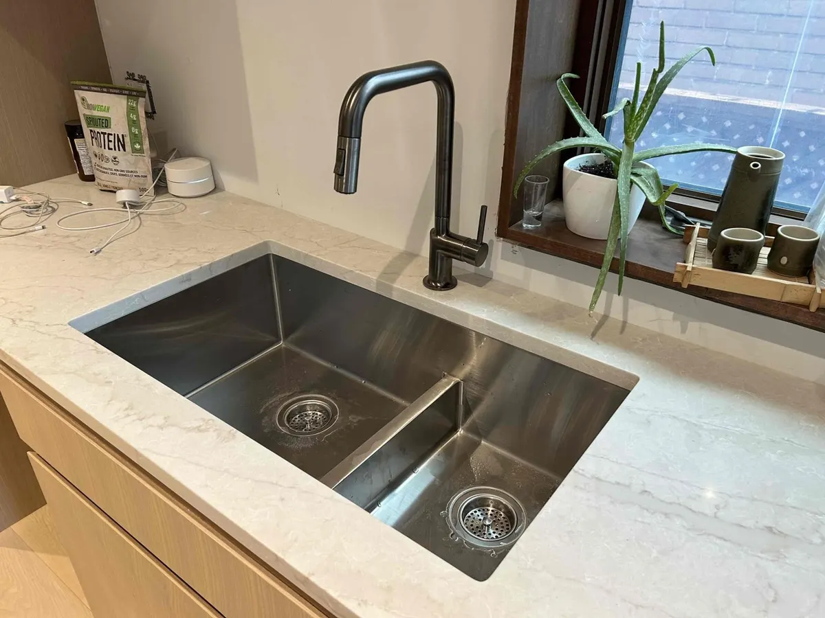 Undermount kitchen sink and pull-down faucet installed