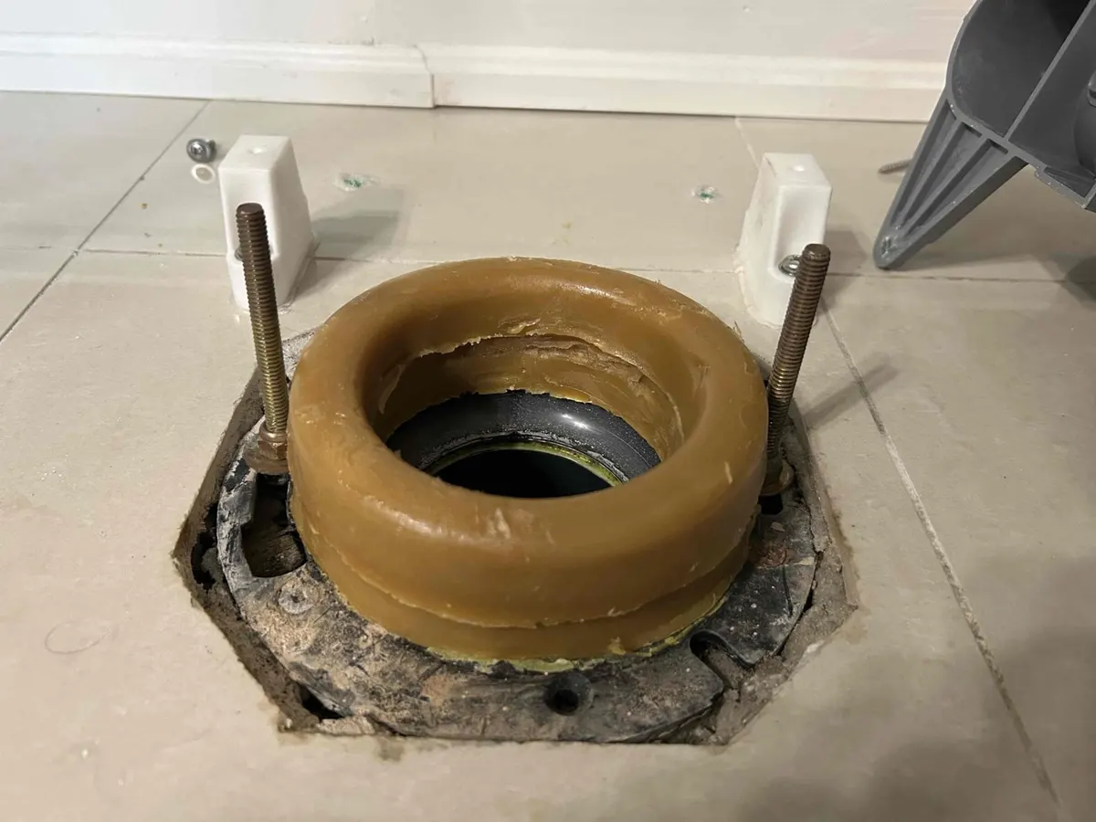 New wax ring set on the flange for a toilet installation