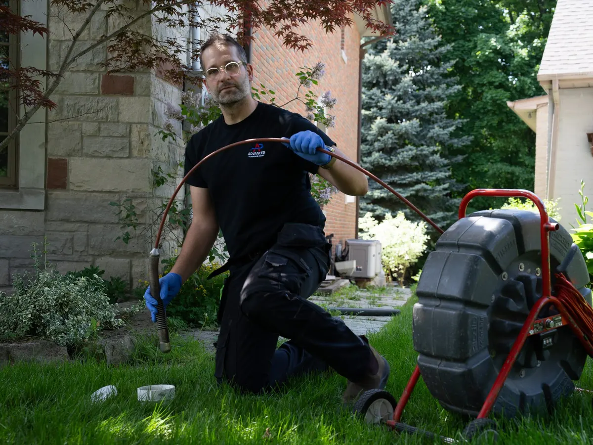 Feeding a sewer camera into a cleanout