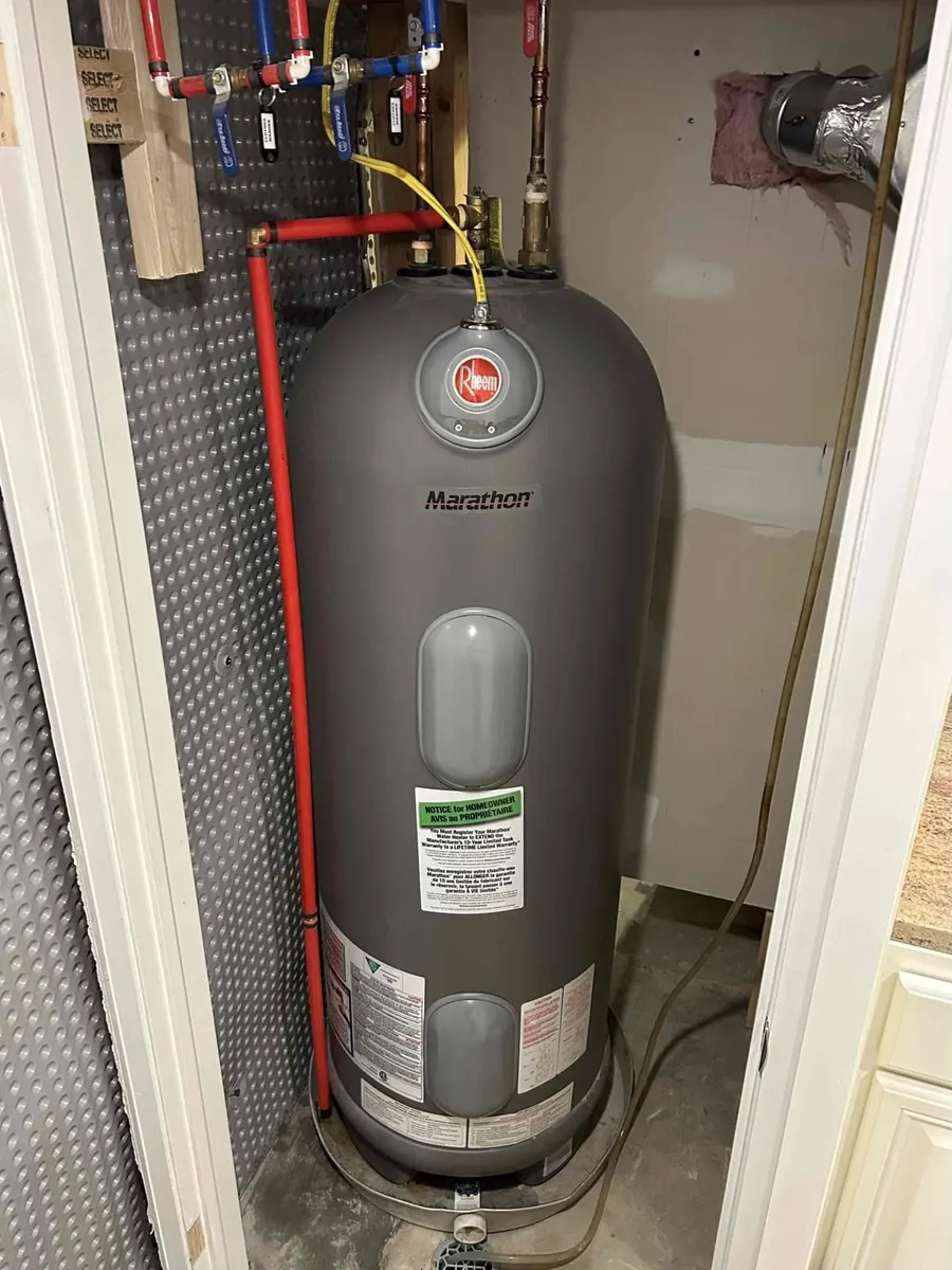 Rheem Marathon water heater installed in a utility closet